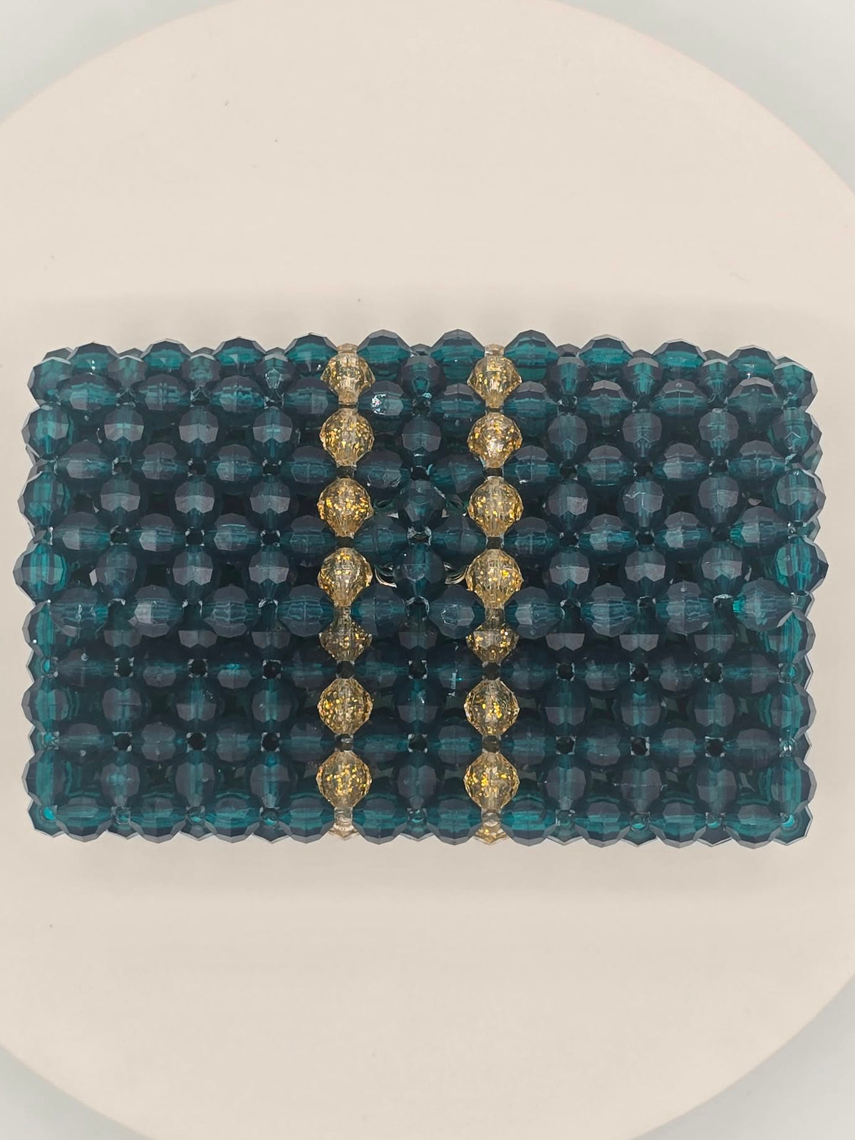 View of teal and gold translucent wallet large