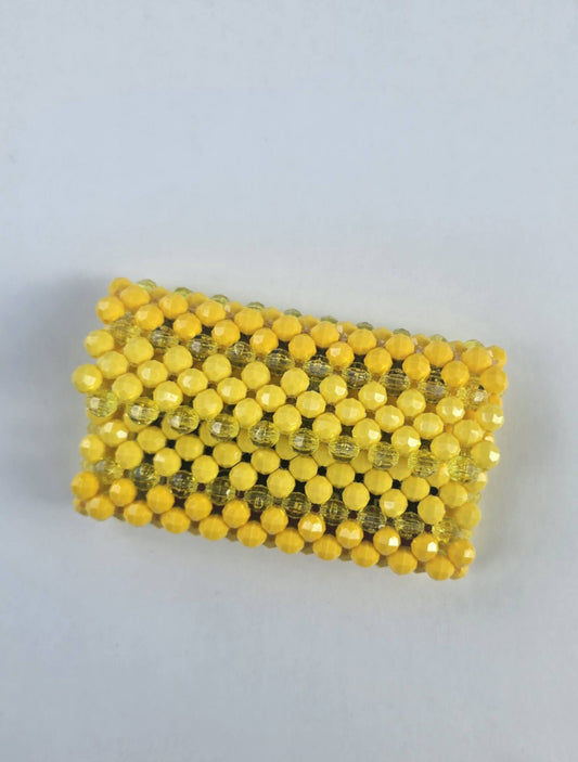 A yellow beaded wallet handmade of 8mm round beads 