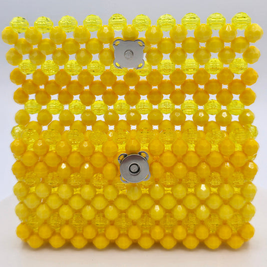 Open view of sunshine yellow beaded wallet. Various yellows in opaque and translucent beads make this one stunning wallet.
